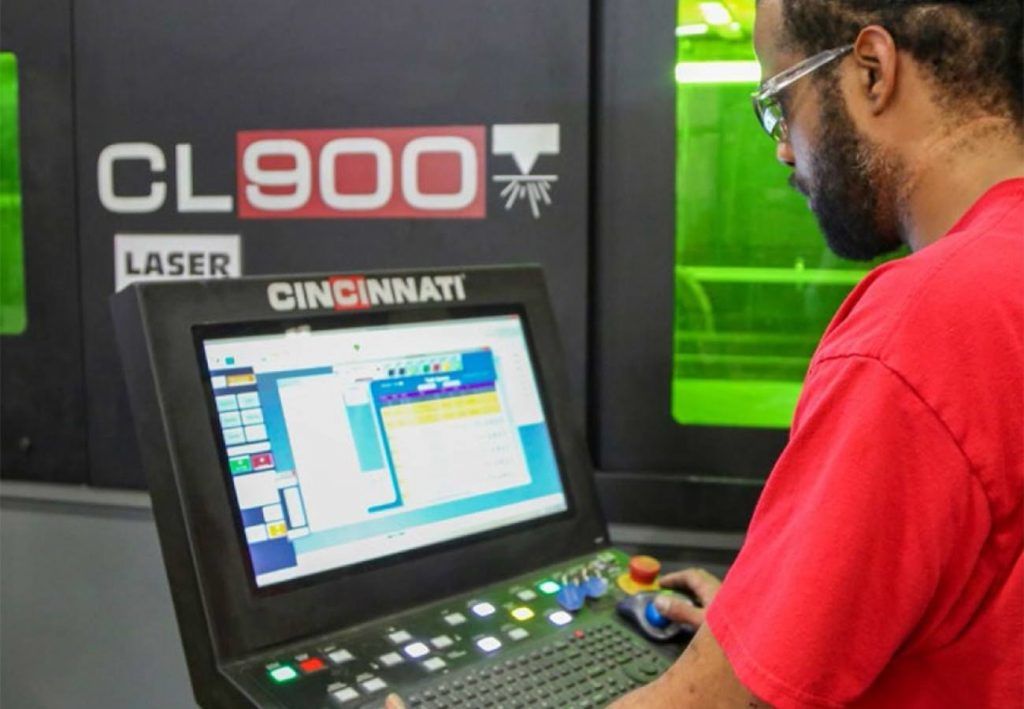 Cincinnati employee at a computer terminal